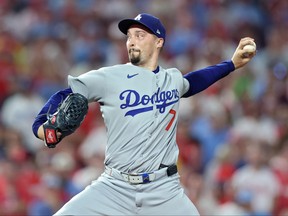Blake Snell from Los -Angeles Doders throws the feed.
