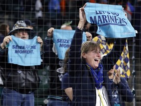 Fans welcome the stands of the Seatl Marines team in Detroit, October 2025.