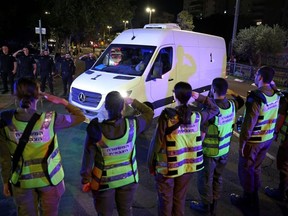 The car carrying the bodies of four hostages