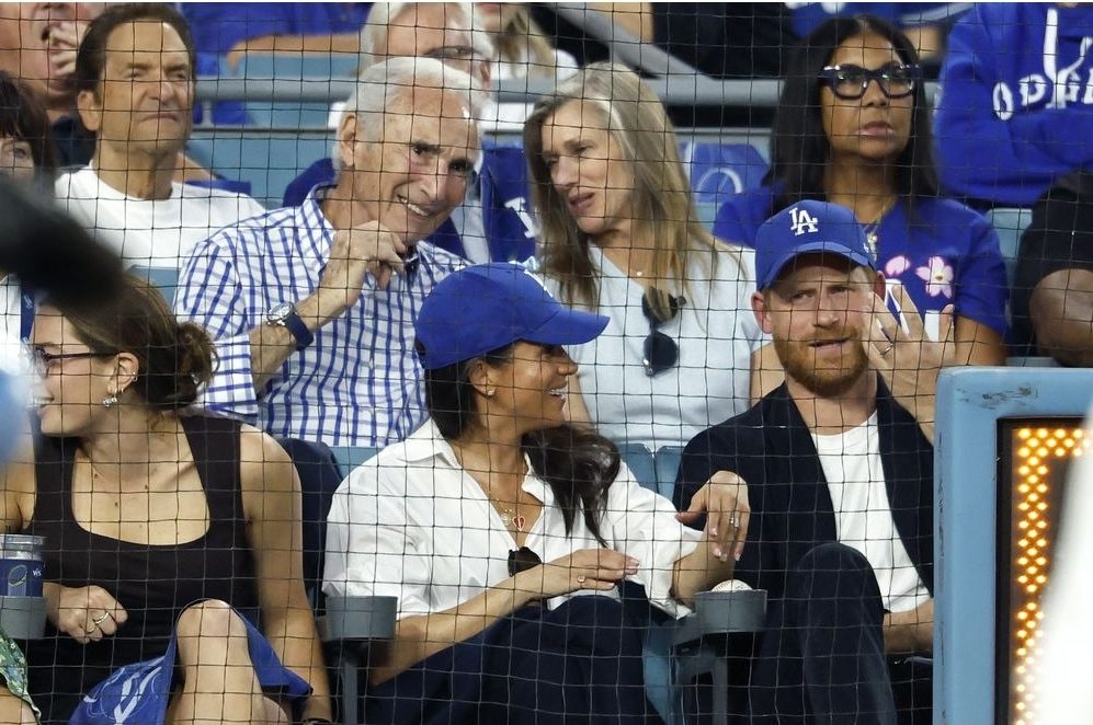 Prince Harry, Duke of Sussex and Meghan, Duchess of Sussex react during game four of the 2025 World Series between the Toronto Blue Jays and the Los Angeles Dodgers at Dodger Stadium on October 28, 2025 in Los Angeles.  Prince Harry, Duke of Sussex and Meghan, Duchess of Sussex react during game four of the 2025 World Series between the Toronto Blue Jays and the Los Angeles Dodgers at Dodger Stadium on October 28, 2025 in Los Angeles.