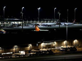 A photo of several grounded planes. (Michaela STACHE/AFP)
