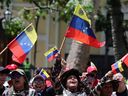 Members of Bolivarian militias gather for military exercises in Caracas, Venezuela, Saturday, Oct. 4, 2025.