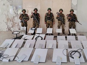 The junta boasted of seizing Starlink terminals this week, and there were only 30 of them, a fraction of the thousands that independent analysts have documented at KK Park. (Handout/MYANMAR MILITARY INFORMATION GROUP/AFP)