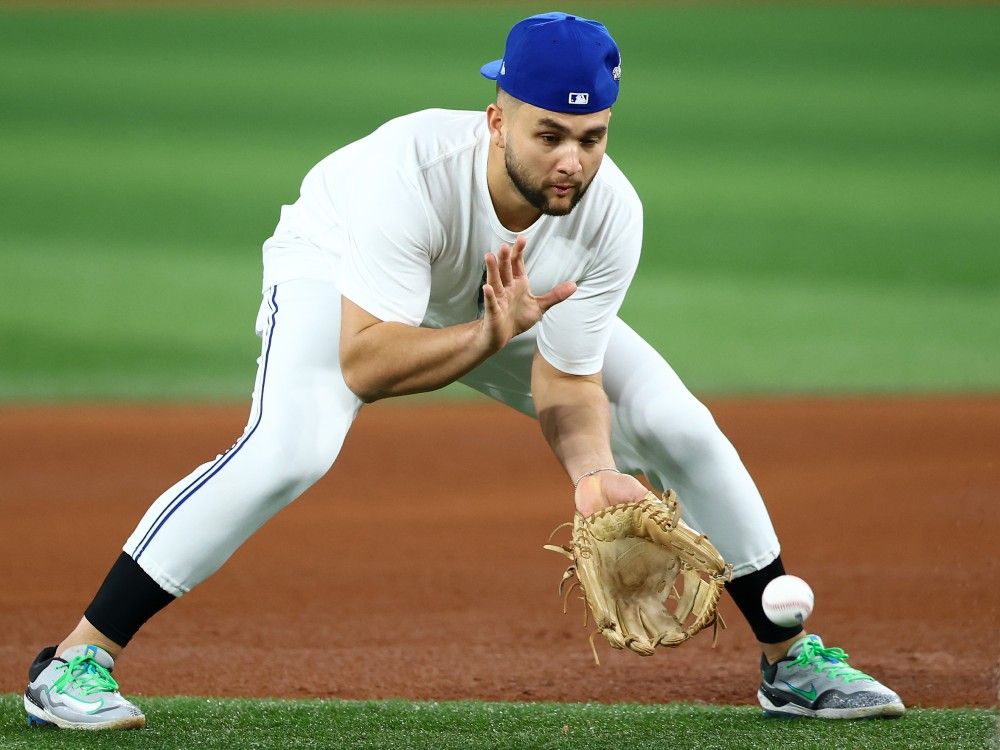 Bo Bichette of the Blue Jays warms up before Game 2 of the 2025 World Series at the Rogers Center in Toronto, Saturday, October 25, 2025. The Jays announced Saturday that Bichette will not start in Game 2 after playing in his first game in seven weeks in Game 1 on Friday.