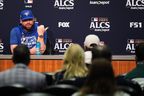 Blue Jays manager John Schneider speaks during a media appearance the day before Game 3 of the American League Championship Series against the Seattle Mariners on Tuesday, Oct. 14, 2025, in Seattle.