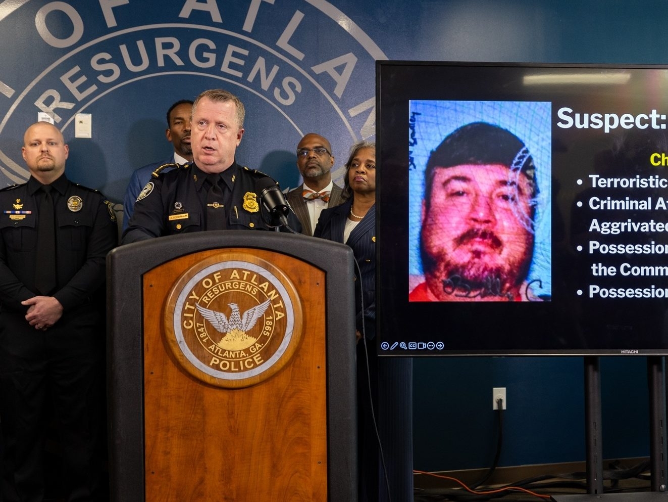 Man accused of plot to shoot up Atlanta airport arrested in terminal, police say