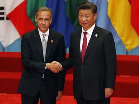 Mark Carney and Xi Jinping.