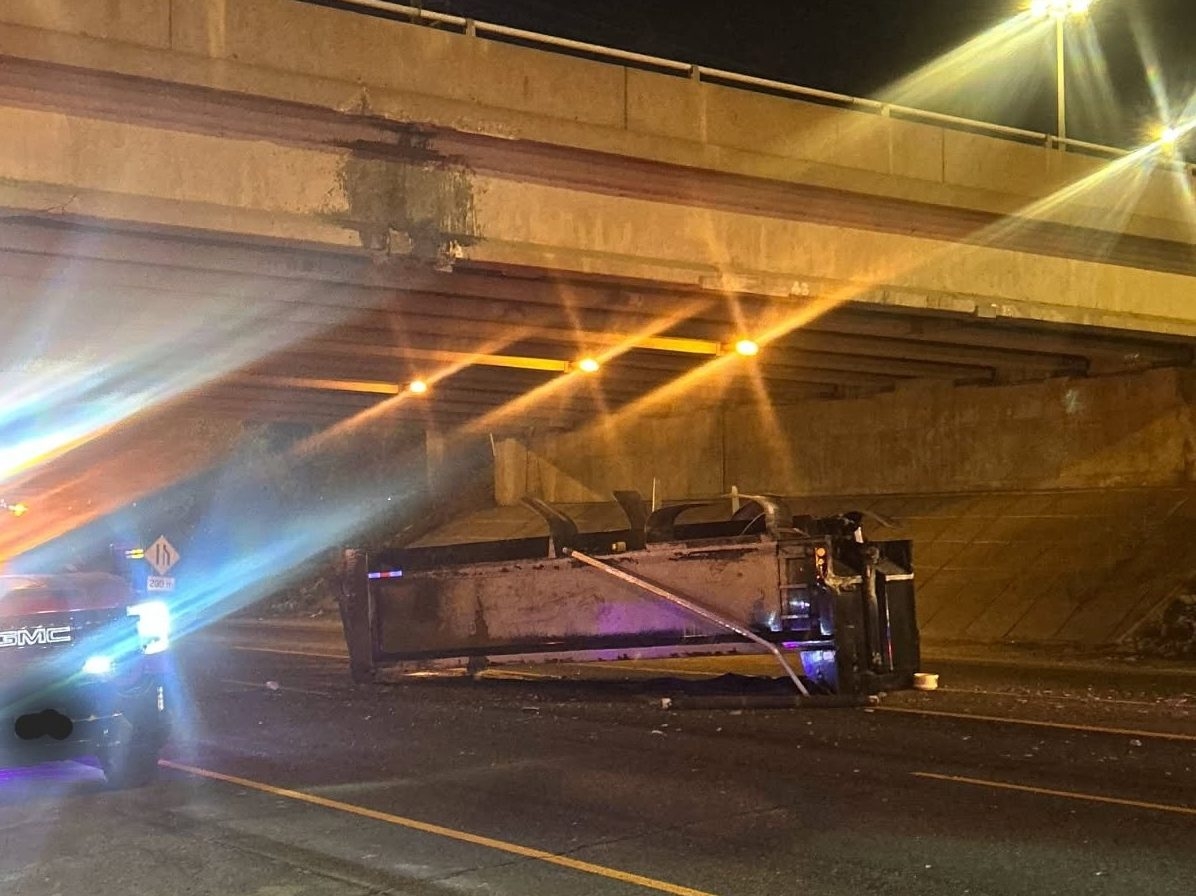  A Brampton driver, 32, has been charged after a raised box on his dump truck hit an overpass on Highway 400 on Oct. 17, 2025.