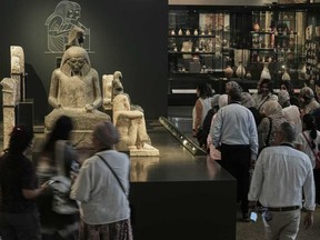 Tourists visit the Grand Egyptian Museum in Giza, Egypt, Friday, May 23, 2025.