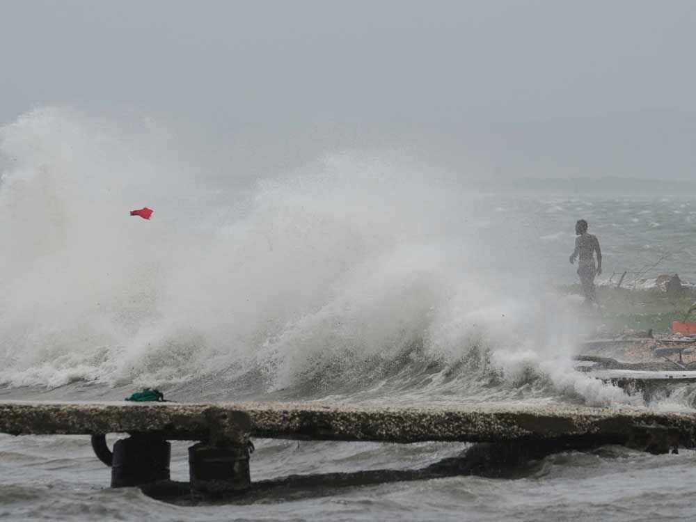 Waves splash in Kingston, Jamaica, as Hurricane Melissa approaches, Tuesday, October 28, 2025. 