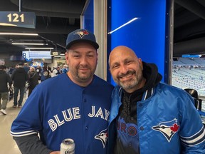 Chris White and Michael Heuchert were all smiles ahead of Game 6 of the World Series in Toronto on Friday, Oct. 31