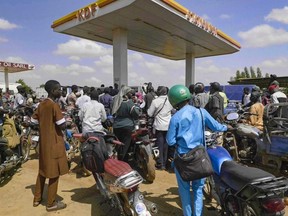 People queue for gasoline in Bamako, Mali, October 2025.