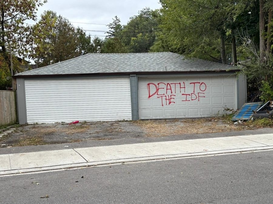  Anti-Israel graffiti is seen on a building in Cedarvale Ravine Park in Toronto.