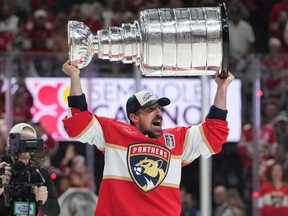 Florida Panthers center Brad Marchand skates with the Stanley Cup.
