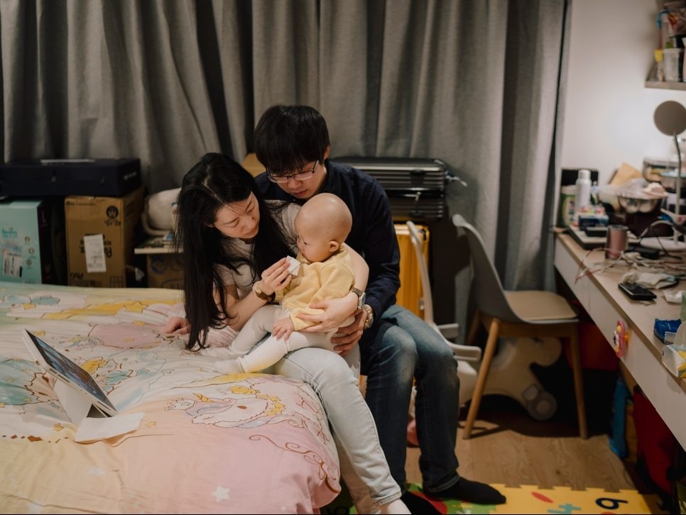A family has a quiet moment while staying in a room provided by Ronald McDonald House Canada. A family has a quiet moment while staying in a room provided by Ronald McDonald House Canada.