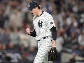 New York Yankes Citcher Cam Schlittler pumps a fist.