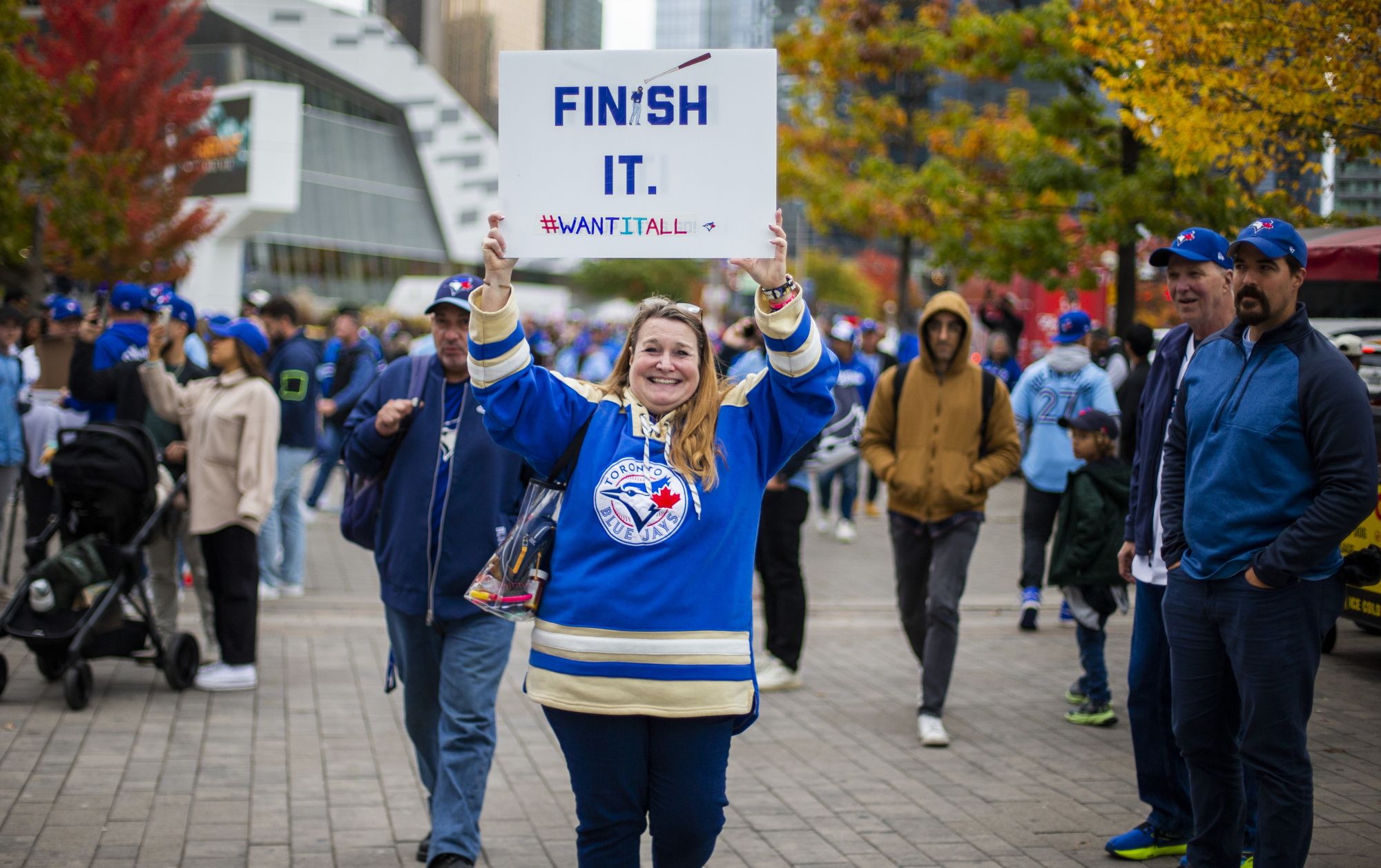Suzanne Taylor, from Buffalo, N.Y., outside of the Rogers Centre before the Toronto Blue Jays host the Los Angeles Dodgers in Game 1 of the World Series on Oct. 24, 2025. 