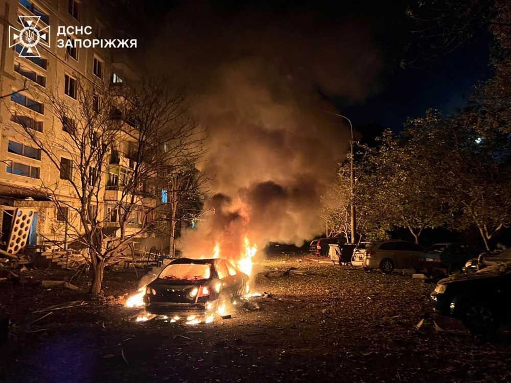 In this photograph provided by the Ukrainian emergency service, fire and smoke rises after the residential building was damaged during the Russian aircraft in Zaporizh, Ukraine, Sunday, October 5, 2025. 