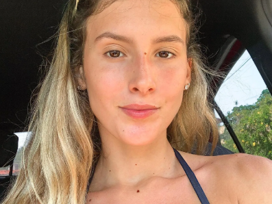 Is bikini-clad Brazilian beauty secretly a Narco boss? Cops say yes, she says no