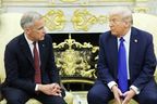 US President Donald Trump (R) and Canadian Prime Minister Mark Carney speak with reporters in the Oval Office of the White House on October 7, 2025 in Washington, DC.