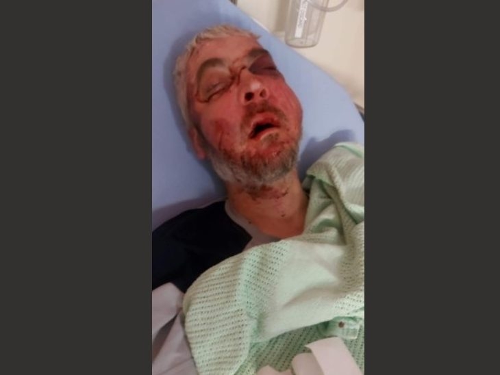 Neil Caulfield is pictured in hospital.  Neil Caulfield is pictured in hospital.