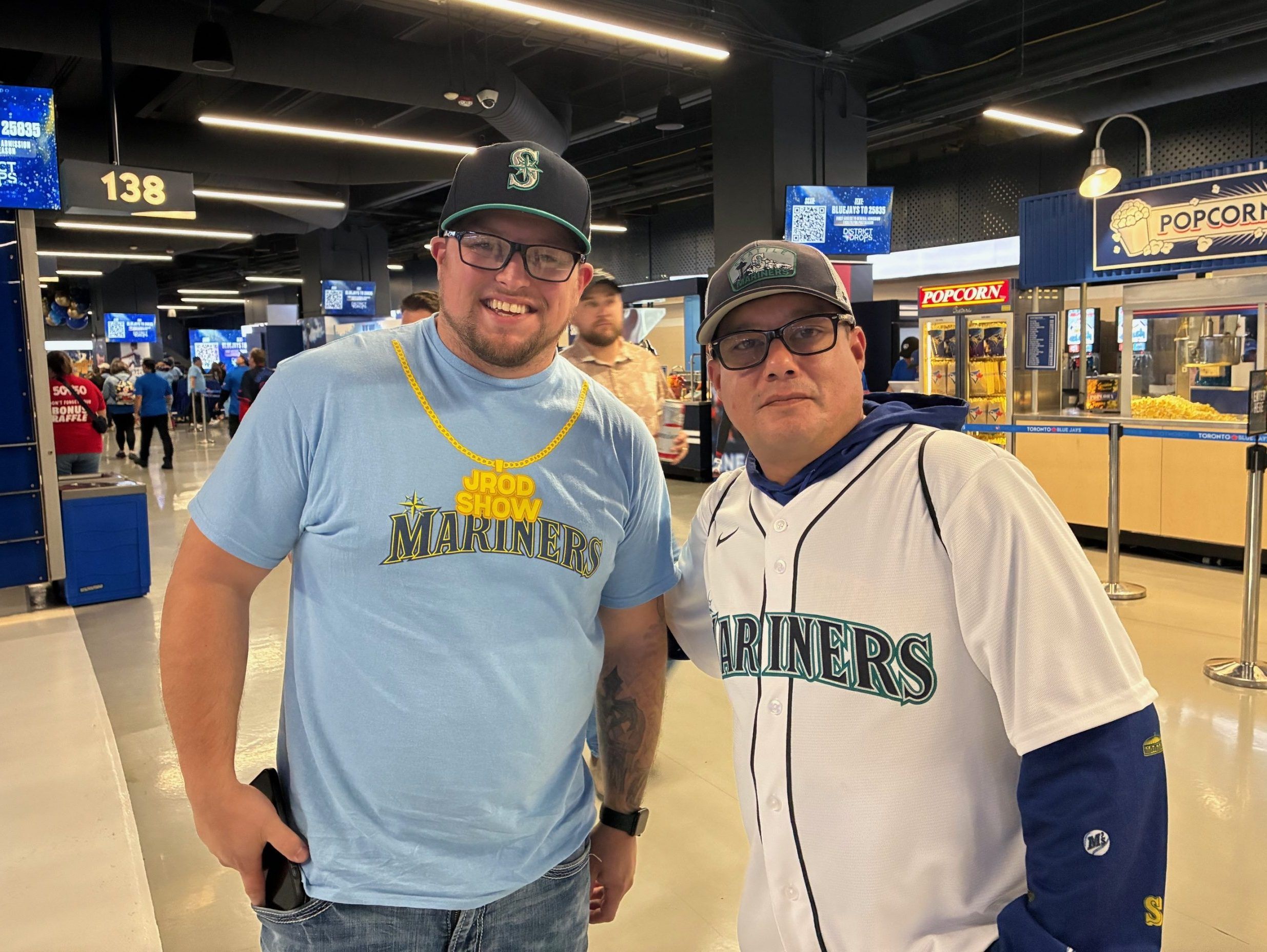 Seattle fans Ryan Sutton and Chris Kalaluhi at Rogers Centre, Toronto, Oct. 19, 2025.