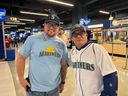 Seattle natives Ryan Sutton and Chris Kalaluhi traveled to the Rogers Center in Toronto to watch Game 6 of the American League Championship Series between the Seattle Mariners and Toronto Blue Jays on Sunday, October 19, 2025.