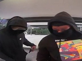 ATM Footage from PNC bank on Sept. 1. showing two of the four suspects who allegedly robbed Curtis Dixon.