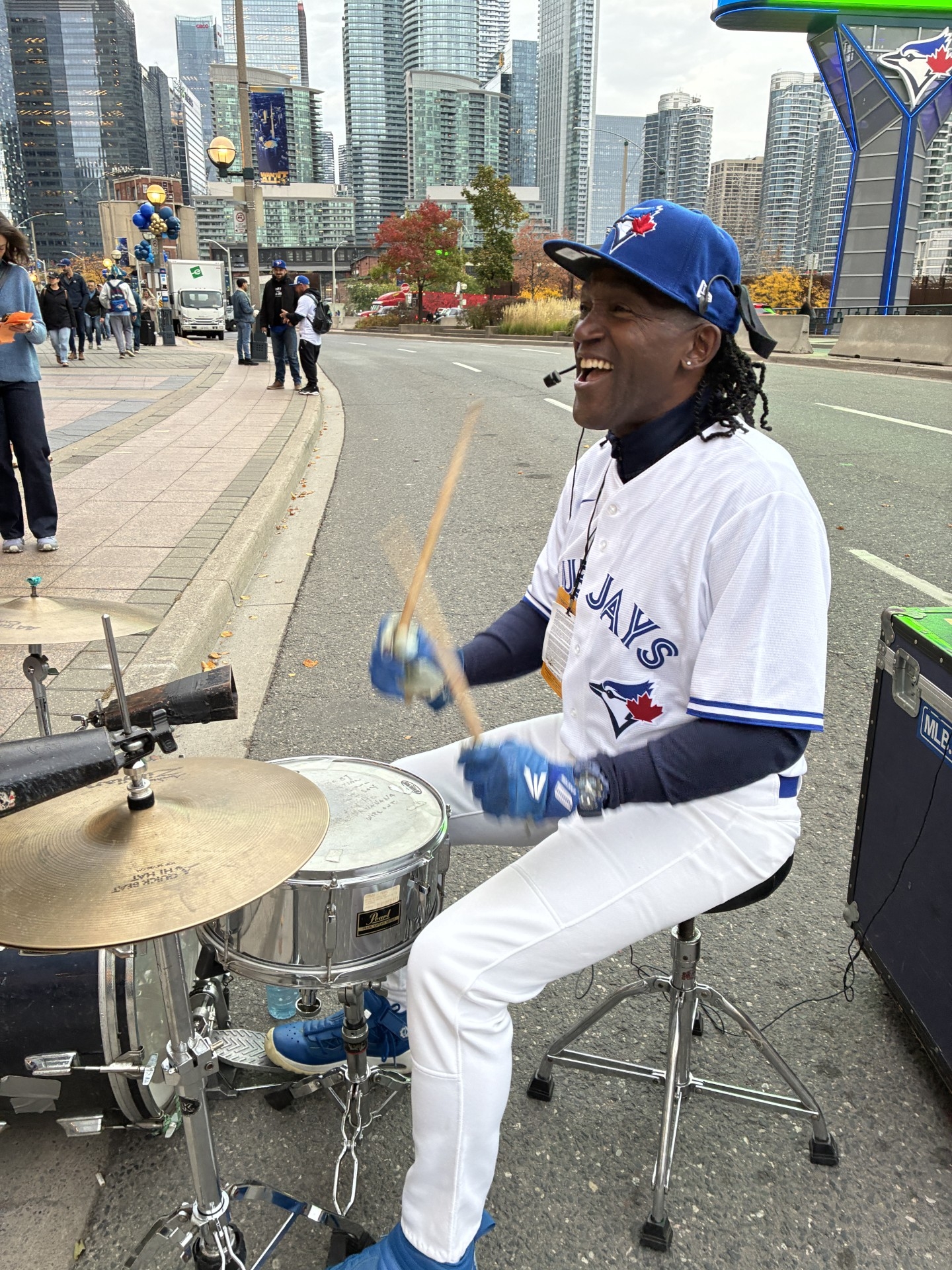 Rockin’ Rick Donaldson, who has been busking outside the Dome for 36 years and plans to retire soon, plays the drums outside the Rogers Centre ahead of Game 1 of the World Series on Friday, Oct. 24, 2025.  Rockin’ Rick Donaldson, who has been busking outside the Dome for 36 years and plans to retire soon, plays the drums outside the Rogers Centre ahead of Game 1 of the World Series on Friday, Oct. 24, 2025.