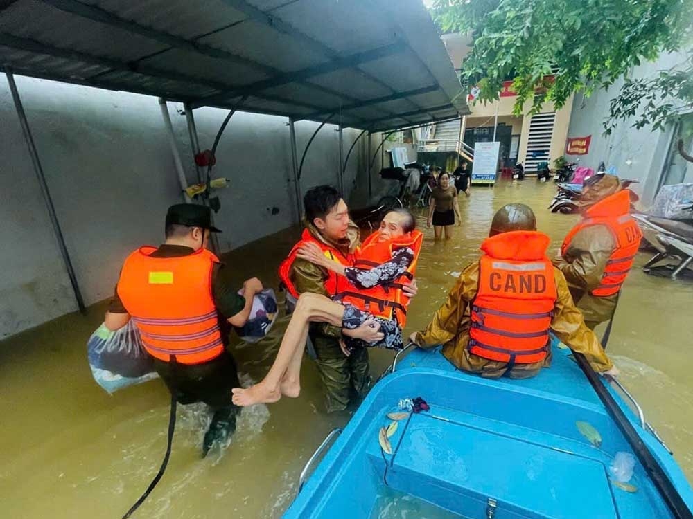 Vietnam’s tourist sites submerged as record rainfall causes major flooding