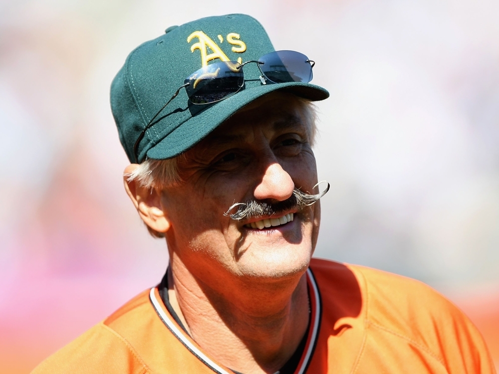 Hall of Famer Rollie Fingers participates in a celebrity softball game in 2007.