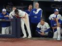 The Toronto Blue Jays dugout looks like Game 7 of the World Series against the Los Angeles Dodgers.