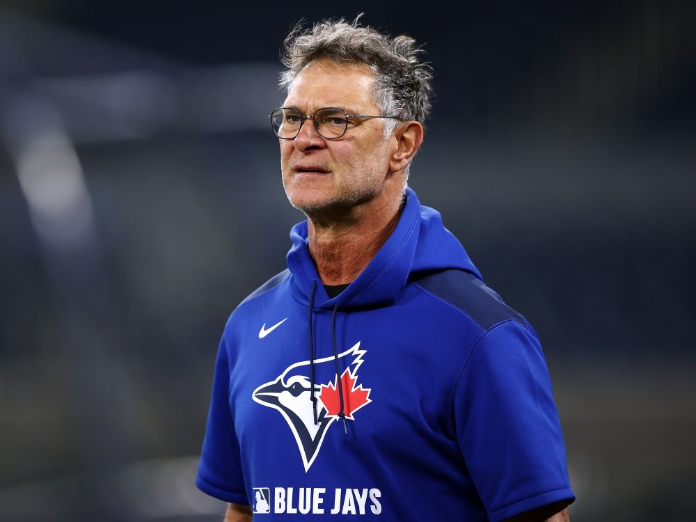 Toronto Blue Jays bench coach Don Mattingly takes the field during practice during the World Series.