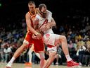 Atlanta Hawks center Kristaps Porzingis and Toronto Raptors Jakob Poeltl were vying for a loose ball during a game last month.