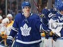 David Kampf of the Toronto Maple Leafs celebrates a goal against the Nashville Predators during a game in 2021.