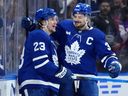 Maple Leafs winger Matthew Nice (23) celebrates his goal with captain Auston Matthews.