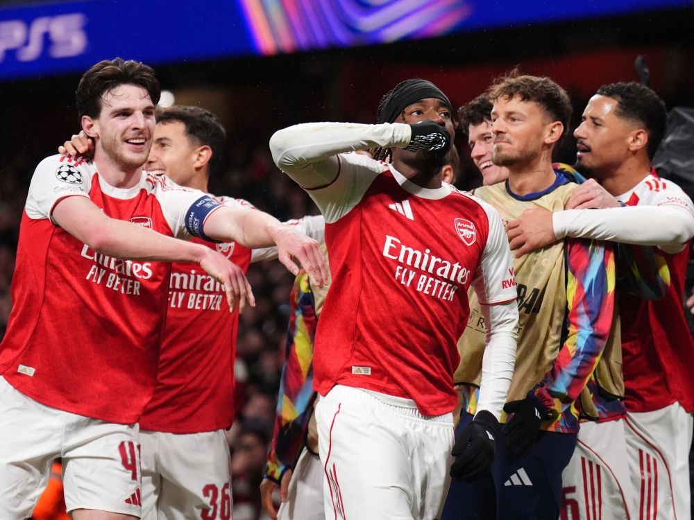 Arsenal's Noni Madueke (centre) celebrates after scoring his side's second goal during the Champions League match against Bayern Munich.