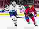 Sammy Blais of the Toronto Maple Leafs skates against Jake Evans of the Montréal Canadiens during a game on Nov. 22, 2025.