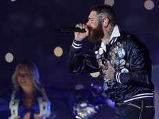 Post Malone performs at halftime of the game between the Dallas Cowboys and the Kansas City Chiefs.