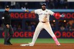 Vladimir Guerrero Jr. #27 of the Toronto Blue Jays reacts after hitting a double during the eleventh inning against the Los Angeles Dodgers in game seven of the 2025 World Series at Rogers Center on November 2, 2025 in Toronto. (Photo by Gregory Shamus/Getty Images)