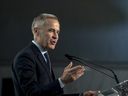 Canadian Prime Minister Mark Carney speaks during a press conference in Deux-Montagnes for the inauguration of the new line of the REM (Réseau express métropolitain) in Montreal, Quebec, Canada, on November 14, 2025.