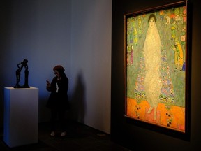 (FILES) “Bildnis Elisabeth Lederer” by Gustav Klimt is pictured at Sotheby’s Marquee Sales Series in New York on November 8, 2025. A portrait by Austrian artist Gustav Klimt fetched $236.4 million in New York on November 18, 2025, becoming the second most expensive artwork ever sold at auction. (Photo by CHARLY TRIBALLEAU / AFP)