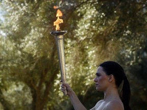 Actresses perform during a rehearsal for the Olympic flame lighting ceremony.