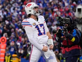 Buffalo Bills quarterback Josh Allen celebrates after scoring a touchdown against the Tampa Bay Buccaneers during the second half of an NFL football game, Sunday, Nov. 16, 2025, in Orchard Park, N.Y.