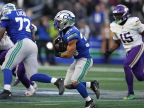 Seattle Seahawks cornerback Tyler Hall (33) runs against the Minnesota Vikings during the second half of an NFL football game Sunday, Nov. 30, 2025, in Seattle.