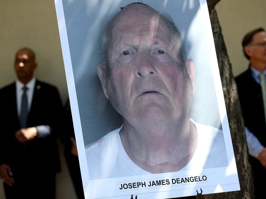  A photo of accused rapist and killer Joseph James DeAngelo is displayed during a news conference on April 25, 2018 in Sacramento, California.