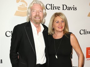 Richard Branson, left, and Joan Templeman appear at the 2016 Clive Davis Pre-Grammy Gala, in Beverly Hills, Calif., Feb. 14, 2016.