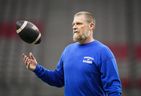 Winnipeg Blue Bombers head coach Mike O'Shea throws a football during practice ahead of the 111th CFL Gray Cup in Vancouver, British Columbia, Tuesday, November 12, 2024.