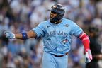 Vladimir Guerrero Jr. of the Toronto Blue Jays celebrates his solo home run during the first inning of Game 5 of the World Series against the Los Angeles Dodgers on Wednesday, Oct. 29, 2025, in Los Angeles.