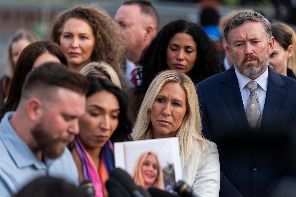  Rep. Marjorie Taylor Greene, R-Ga., second from right, and Rep. Thomas Massie, R-Ky., right, react during a news conference on the Epstein Files Transparency Act, Tuesday, Nov. 18, 2025, outside the U.S. Capitol in Washington, D.C. Julia Demaree Nikhinson/THE ASSOCIATED PRESS